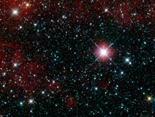 This infrared snapshot of a region in the constellation Carina near the Milky Way was taken shortly after NASA's Wide-field Infrared Survey Explorer (WISE) ejected its cover