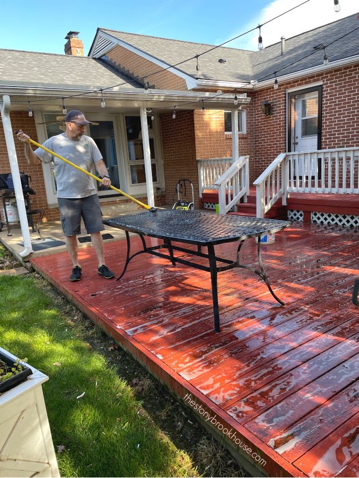 Hubby cleaning deck