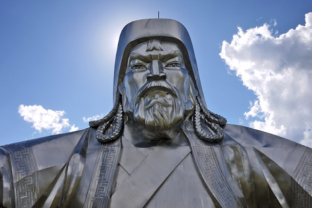 Close-up photo of a metal statue of Genghis Khan.