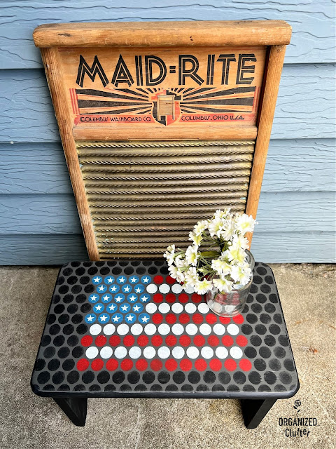Photo of penny tile flag patterned wooden stool.