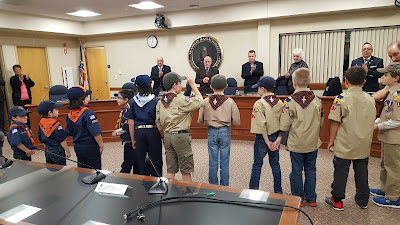 Cub Scout pack 17 get applause after leading the Pledge of Allegiance