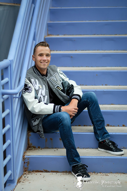 Professional portrait of a high school senior guy at a park Volcano Vista High School