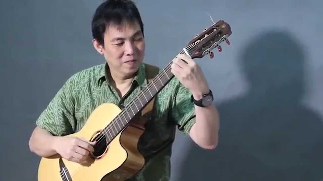 Adjie Soetama feat Trie Utami