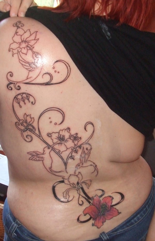 Back Piece Hawaiian Flower Tattoos For Girls Picture 5