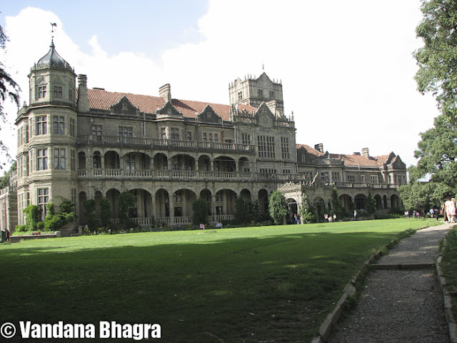 Indian Institute of Advanced Studies : Colonial legacy, Shimla’s pride Vandana Bhagra, ShimlaPhotos by meA historic landmark of Shimla and a legacy left behind by the Britisher’s, but no matter how many times you visit this architectural marvel you would want to go back again and enjoy its serene environment and immaculate ambiance. Rich in history and with is Victorian edifice, Viceregal Lodge, now famously known as the Indian Institute Advanced Studies (IIAS) was completed in 1888 by Henry Irwin its architect. Lord Dufferin, Viceroy of India during that time personally supervised the construction and the furniture was fitted by Maple & Co., London who perfected in Victorian period. It is also noted that the architectural style drew inspiration from English Renaissance and certain elements of Scottish castles can also be seen here.In the words of Lady Duffering who recounted her stay on July 15, 1988, “The result of the whole was to make me feel that it is a great pity that we shall have so short a time to live in a house surrounded by such magnificent views”. Set within the large wooded estate of the Observatory Hill, (one of the seven hills Shimla is built on) IIAS became the Rastrapati Niwas after Independence which was then officially handed over to the Institute by President S Radhakrishnan on October 20, 1965. This place also has historical significance as the 1945 Shima Conference was hosted by the 19th Viceroy of India, Viscount Archibald Wavell, which was attended by major political leaders including Pandit Jawarharlal Nehru, Sardar Patel, Maulana Azad, Liaqat Ali Khan, Master Tara Singh and Mohammed Ali Jinnah.Khem Raj Verma, Supervisor of the Institute states, “The old fire station was converted into the Fire Station Café with a Souvenir Shop in 2009. Here tourists can take a well rested break after visiting the Institute. A selected collection of books both in Hindi and English, collectibles such as mugs, sweat shirts, caps and greeting cards with the Institutes images, a small café with few tables serving limited snacks as well as a visitors information centre cum ticketing counter have been opened”.Notable recent changes that have taken place are the Court Gallery which was once a Squash Court and the Pool Theatre which was a Swimming Pool. The Court Gallery consists of rare collection photographs of the Institute dating since 1888, which were procured from the Bowood Estate, Western Part of United Kingdom and the British Library, London in 2010. Verma added, “With help from the Middlesex University, we were able to get these photographs. The swimming pool built in 1888 is now a plush theatre where movies are featured for resident scholars and the Institute’s students. Conferences, meetings and conventions too are held here from time to time. Efforts are being made to open more and more areas for the tourists while at the same time maintaining the sanctity of the place”.Guided tours started in 1992, initially there were no charges but after seeing the growing number of tourists nominal charges were taken as part of the maintenance cost. The guide would at lengths explain the history of the Institute and its passing owners. The elaborate wood work, the paneling and pilaster, usages of teak, deodar and walnut woods and impressive carvings are works of marvel. Gitesh Arora and family from New Delhi were ecstatic about their visit and went on and on about the beauty of the building and its architecture. Gitesh said, “The landscaping and the design of the building is very beautiful, but the guided tours are quite dissatisfying. The groups are so large that it is difficult to understand what the guide is saying and the rushed walk around is a little disappointing”. Justifying this Verma added, “Since last year the number of tourist has increased two-fold and weekend rush is huge hence the tour timings are decreased to 25 minutes from a 45 minute tour. This is something which we cnnot control as the growing number of tourists needs to be accommodated and this is the only way we can do so. Weekdays are much more relaxed”. Purnima from Mumbai says, “The elements of Victorian architecture are just incredible and a walk around the Institute is equally charming and extravagant. The manicured lawns, the beautiful garden and all around greenery is breathtaking”.As you walk towards the main entrance, you can see the huge landscaped lawns on to your left and the gravel stone walkway reminds you of the era gone by. Once inside you are greeted with a huge iron-wrought chandelier and immaculate woodwork, a reminder of the elegance, sophistication and grace which the Britisher’s embraced while staying here. Only two rooms are open for the tourists and the insides of the Library can be seen from the huge glass door, the upper floors are off-limits as these are now reserved for the visiting professors and the Director of the Institute. One of these rooms has the round table and chairs that were used during the Simla Conference and another amazing thing about this room is that its roof was built with walnut tree wood which dates almost 125 years now.The main attraction of the Institute is its Library which was opened in 1965, with exclusive access to members only. Prem Chand, Librarian, who took reins in February 2009 says, “You will find hardcore books on every subject as there are more than 1,30,000 books, around 6000 journals and private compilations of eminent scholars, which constitutes a unique collection and the finest resources not only in India but all over the world. The library obtained rare Sanskrit, Arabic as well as Persian texts and manuscripts. Despite coming from a different background as my work was more about connectivity of all Indian libraries to make a huge pool of resources as well create a database of e-resources, I am using this experience to create something similar at this Library”. He added, “We have done away with the cards system as each book has now been assigned a bar code as it is very easy to track books now. Usage has become very easy and certain norms for usage of the Library have also been relaxed. Apart from the reglar 40 scholars who are internal members, 20 professors who come every month from different parts of India for a month, there are another 80 members from outside the Institute such as government employees, teachers or research students who can have access to these vast resources”. The section on rare books and archives is phenomenal but any documents pertaining to Lord Mountbatten and Mahatma Gandhi were taken by the Britishers when they left. The collection includes books on philosophy, religion, fine arts, sociolinguistics, psycholinguistics, socio-economic planning and development, social and cultural anthropology, ancient and mediaeval Indian history and culture, modern Indian history, and Third World economics, which are considered as stupendous. The electronic system introduced is gaining popularity and with access to more than 8,000 journals which were purchased from Cambridge, Oxford and other Universities helps students in research as per se the Institute can subscribe to only about 250 journals. Dr M Pathak, Associate Professor from the National Defense Academy, Pune, on a one month visit to the Institute says, “I am here under the IUGC programme to present a paper on ‘Transnational Terrorism in Kashmir’, and there are nearly 20 other professors visiting from all over India from different universities. This is a unique Institute with amazing library resources, best hospitality and great people. The collection of rare books is the best I have seen and few particular books written on Kashmir were found here only. Even though this is my second trip, still every time it is quite refreshing and enlightening when I come here”.Anyone who has seen the Institute’s magnificent aura and charm definitely takes back few good memories. Those visiting can witness the phases of Indian history, coming and going of Viceroys, political documentations and the visiting professors and scholars who will foretell the magnitude of this Institution and what it means to them. Come with an open mind to fill your senses with fresh impressions of this Institute and the legacy that the British royalty left us with, which has become a statement of pride for us, Shimlaites.