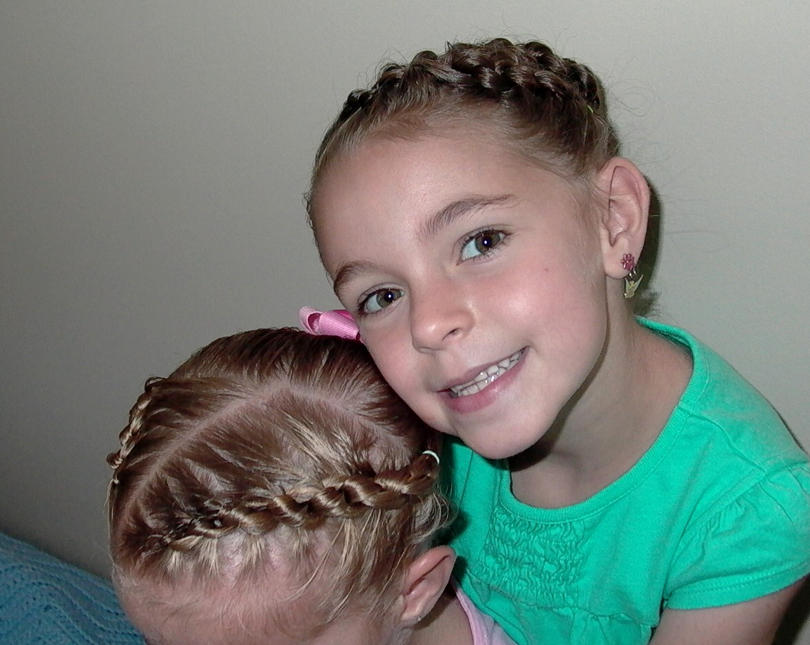 Little Girl's Hairstyles - How to do different hairdo's with a Daisy  title=