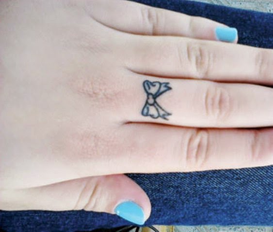Cute Bow Finger Tattoo Designs And Ideas ~ Calgary 
