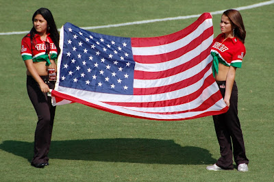 Tecate girls display American flag at futbol tecate