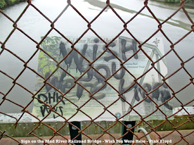 "Wish you were here" sign vandalism joke on the Mad River Bridge in Arcata, CA