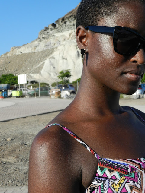 six sunglasses and earrings