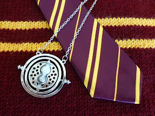 Griffindor tie, sweater, and time turner