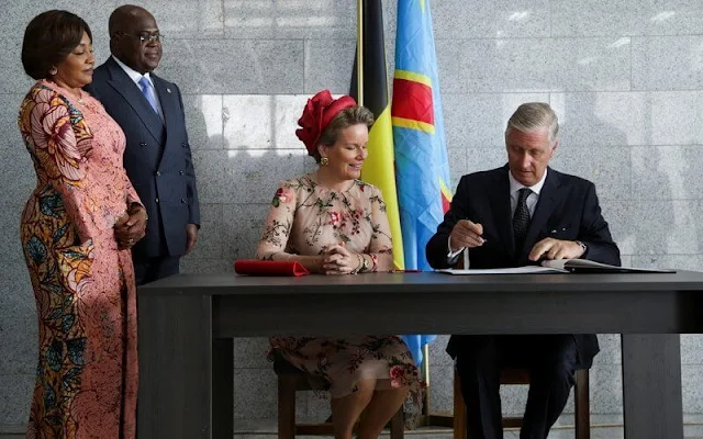 Queen Mathilde wore a flower pale pink midi dress from Natan. President Felix Tshisekedi and First Lady Denise Nyakeru