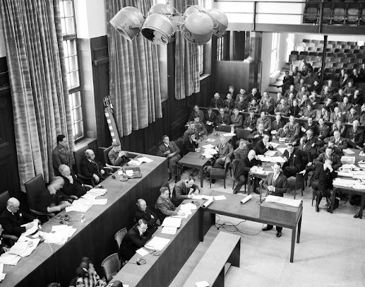 Nuremberg Nazi war crimes evasion justice State Department deportation history