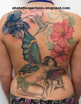 female back tattoos-fairy-and-flowers-back-piece-tattoo