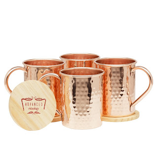 I am in love with Moscow Mule Mugs - they are handcrafted, 100% copper and they are just beautiful and shiny.  Moscow Mule Mugs were created for the drink of the same name but they work great for any mixed drink and they definitely lend an air of style to any get-together or party.  I love all the styles and shapes they have and they really look antique and it makes me think of the old days when all they had were copper mugs before plastic was invented.  These awesome mugs also keep your drinks colder longer and they have great handles that are welded so there is not problem with handles coming off.    The best part is that they won't tarnish, they are easy to clean and this set just happens to come with 4 mugs and 4 pure wood coasters that are smooth and perfectly round.  No rough edges on any of it!  This one would make an awesome gift set and would go great as an addition to any drink mix set :)  $53.99 on Amazon, pick a set up today for someone and start their collection!