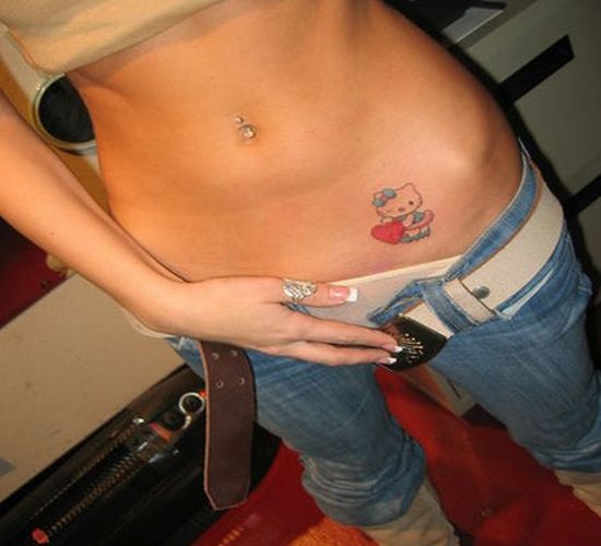 Flower stomach tattoo. in my opinion i wouldnt recommend a tattoo on your 