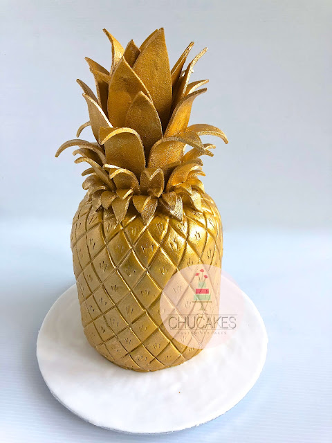 Golden pineapple cake chucakes sculpted singapore cake