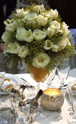 Mesa de boda con centro alto