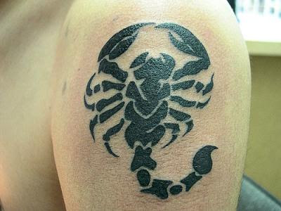 Scorpio Zodiac Tattoo Design On Male Arm. Cool Tribal Tattoos on Back and