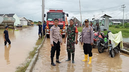 TNI-Polri Berikan Pelayanan Terbaik Kepada Korban Banjir di Kibin