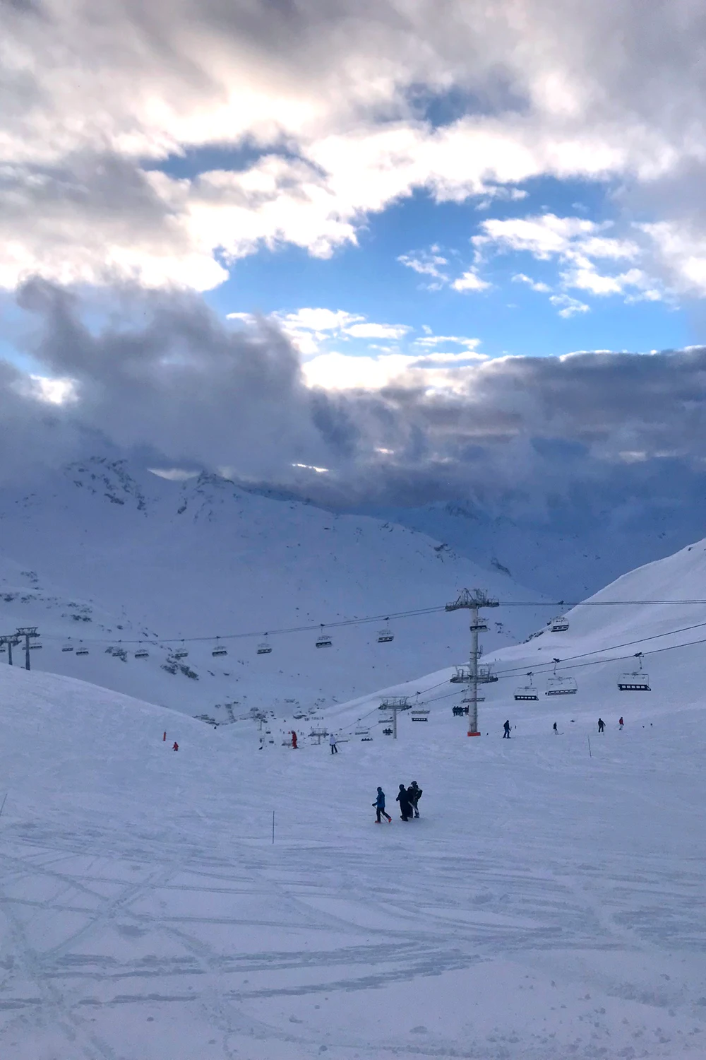 Cloudy blue skies in Val Thorens, France - travel & lifestyle blog