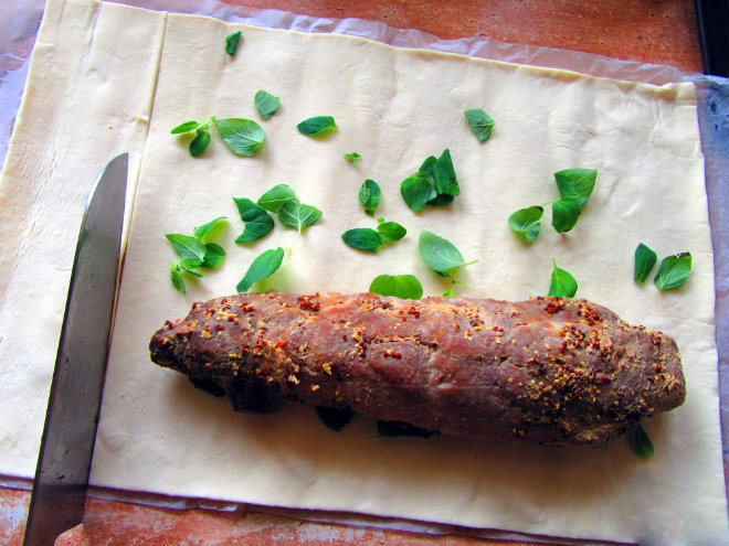 Pork tenderloin in puff pastry by Laka kuharica: place the cooled tenderloin along the longer edge of the dough.