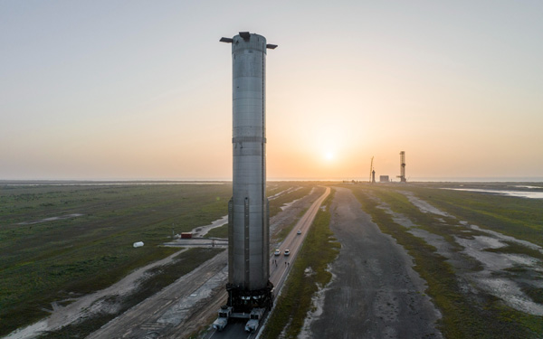 Starship Super Heavy's Booster 9 continues its move to the orbital launch site at Starbase in Texas...on July 20, 2023.