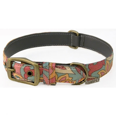 Picture of the collar that we are giving away , it's a fancy buckle collar with the color being a fantasy type theme, with flowers/vines on it.