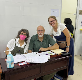 Three members of the IEP medical mission patient intake staff.