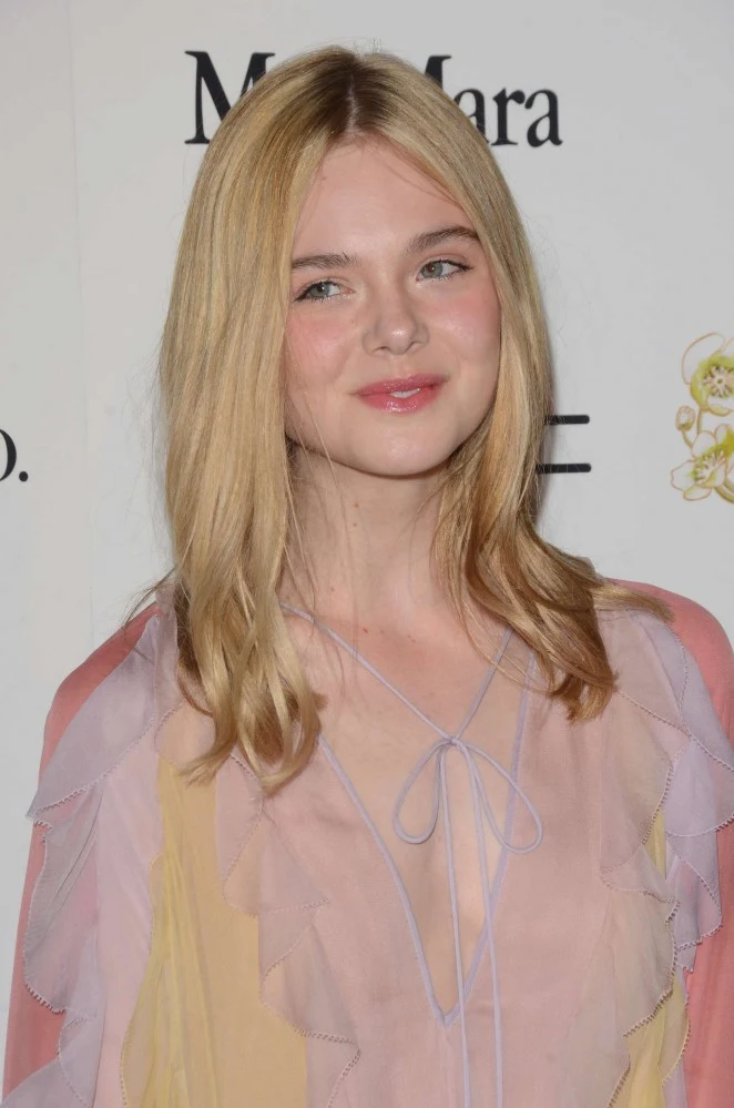 Elle Fanning is a pastel delight at the 8th Annual Women in Film Pre-Oscar Cocktail Party in LA