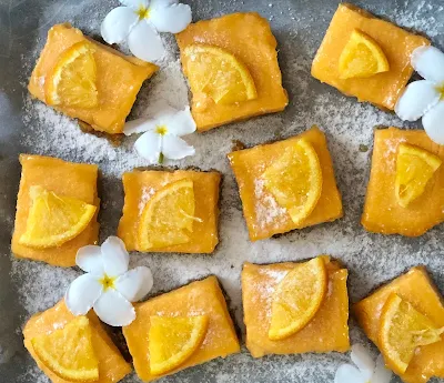 Photographs of orange bars (eggless )