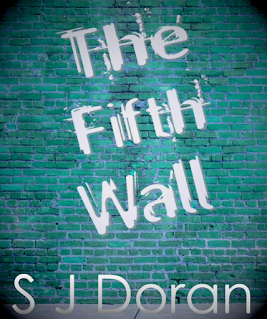 Title The Fifth Wall in graffiti on a turquoise brick wall