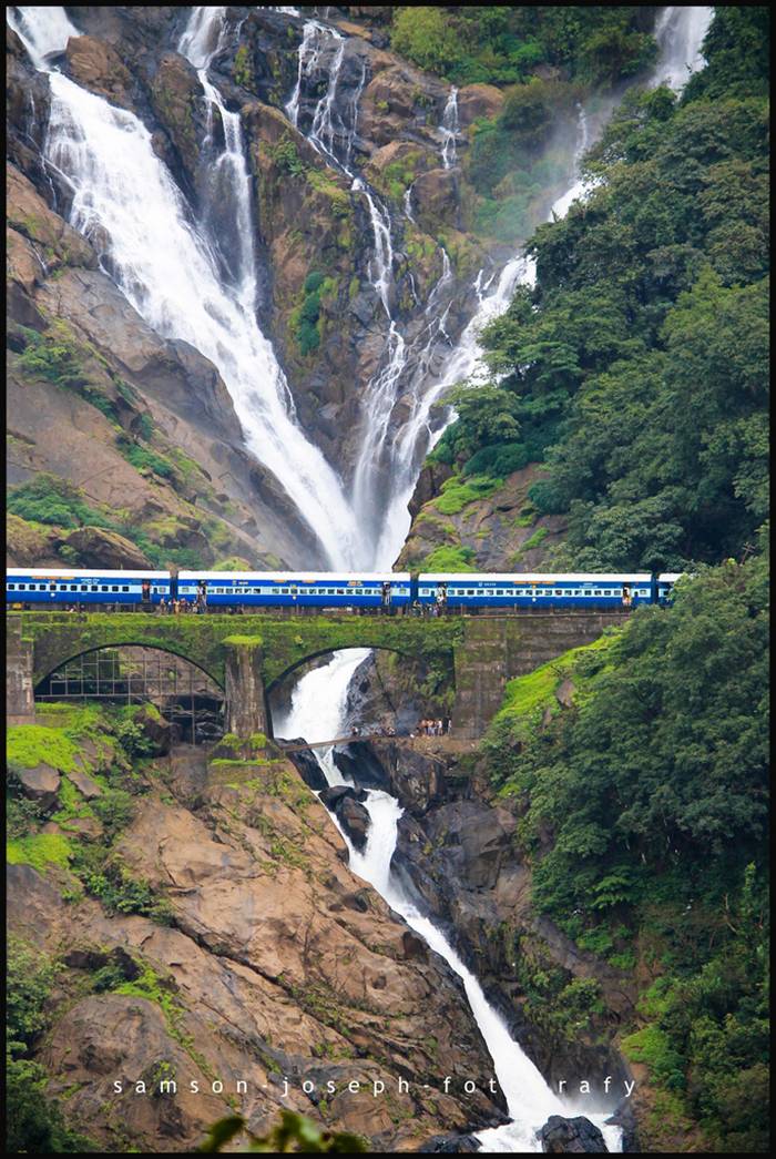 Amazing railroad track located near Dudhsagar Falls, India. One of the most beautiful views you will ever see while travelling with a train.