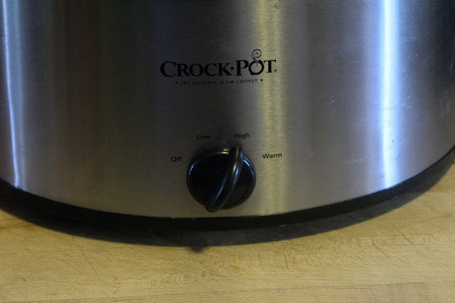 The crock pot setting set to HIGH.