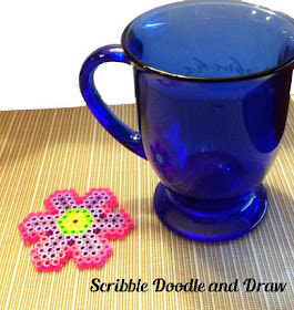 Have kids make a flower out of perler beads for mother's day gift