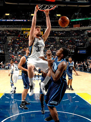 Marc Gasol dunking Paul Bunyan-style on Paul Millsap, via NBA.