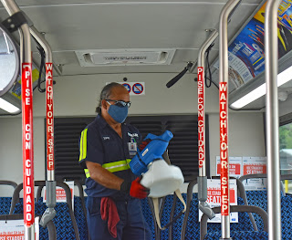 employee using disinfection fogger