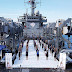 Indian Navy personnel performing yoga at high seas