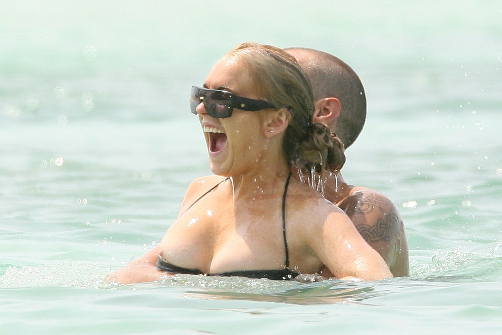 Lindsay Lohan Bikini Nipslip In Bahamas.