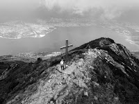 Cross on Mountain - Photo by Claudio Carrozzo on Unsplash