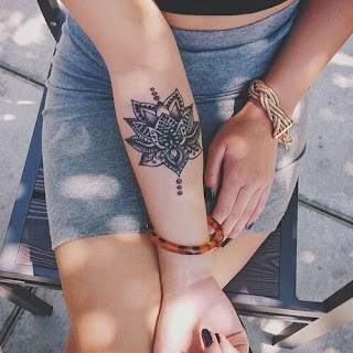 tatuaje mandala antebrazo chica