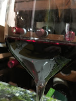 A ruby red glass of Umbrian Sagrantino red wine
