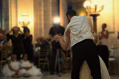 The married couple dancing at a wedding