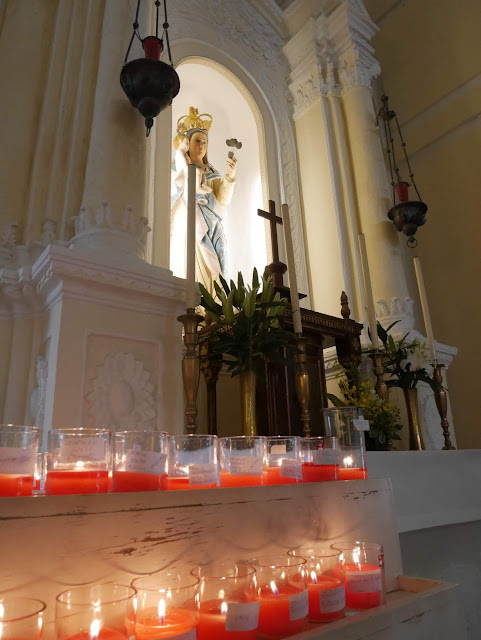 votive candles inside St. Dominic's Church in Macau