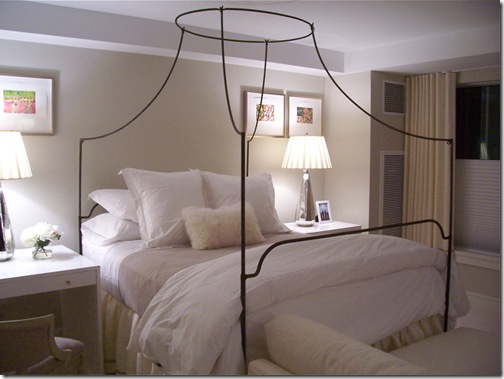 surroundings blog white bedding with iron canopy bed