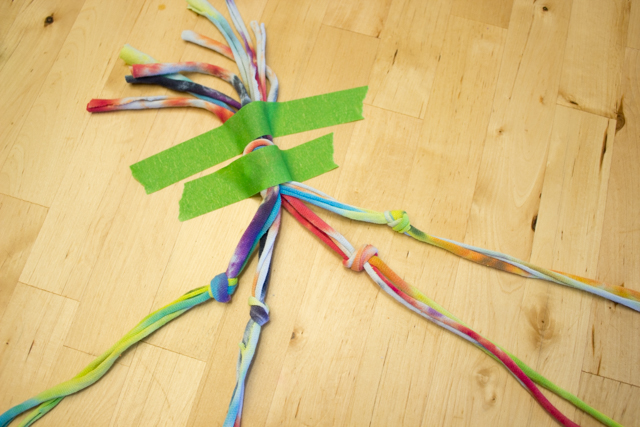 how to make easy DIY Macrame Plant Holders from old tie dye T-shirt fabric yarn, the perfect summer craft for the whole family (kids too!)