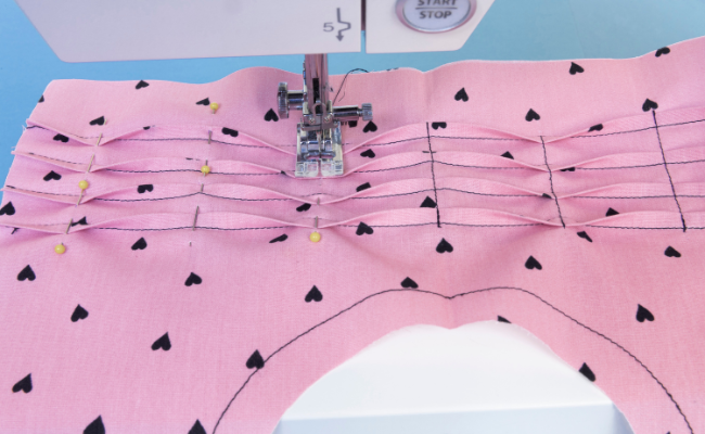 Step by step photo showing how to sew the undulating tucks on the Marnie sewing pattern.