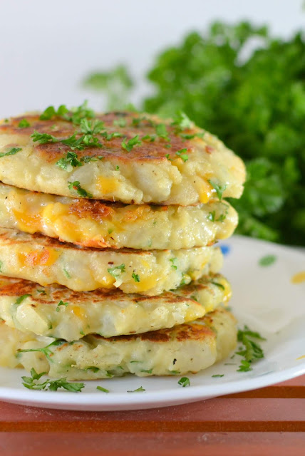 This is one of the best recipes to use leftover mashed potatoes, especially after the holidays! A mixture of fresh herbs, garlic and some cheesy goodness makes this potato pancake perfection!