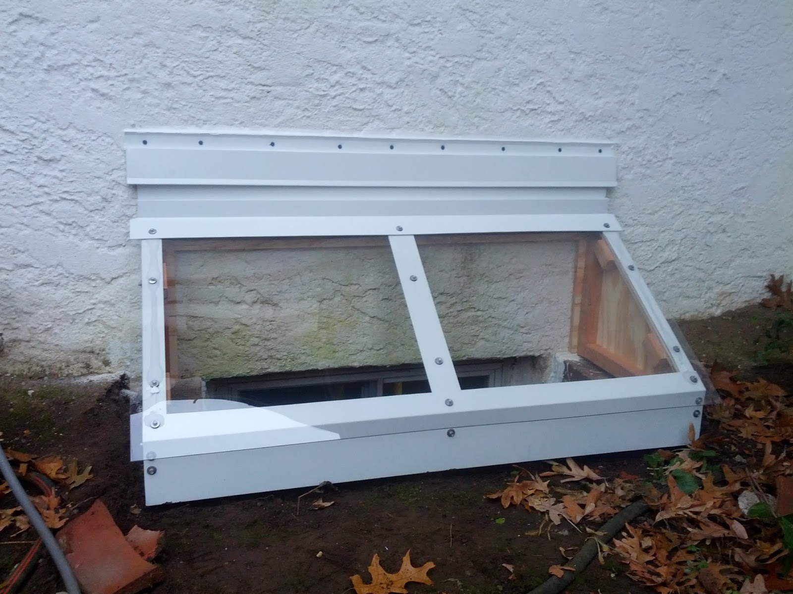 Covering A Window Well The Penultimate Woodshop