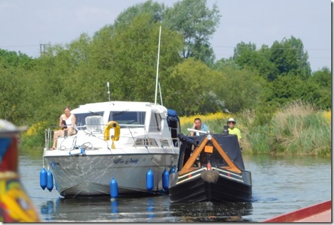 7 narrowboat and cruiser breasted up